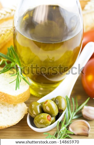Green olives, olive oil, tomato, fresh bread and herbs
