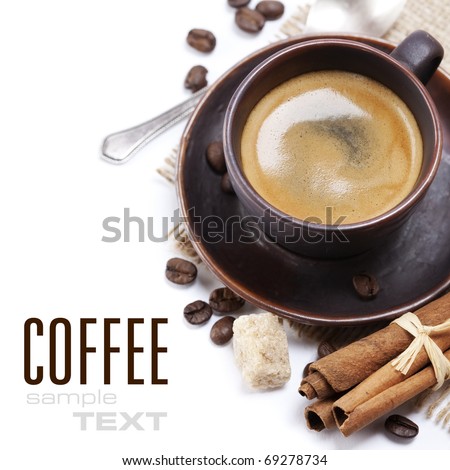 Closeup shot of freshly prepared cup of italian espresso with cinnamon, coffe beans, brown sugar and chocolate over white (with sample text)
