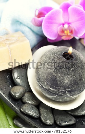 Spa Settings (zen stones, candle, towel, soap and orchid)