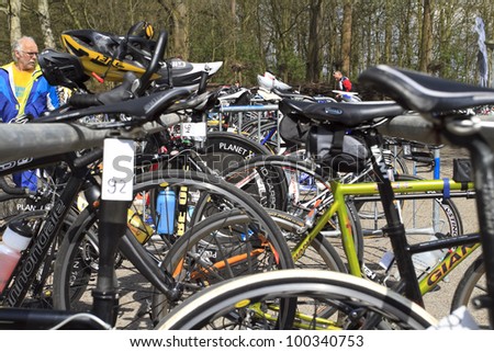 DORDRECHT, NETHERLANDS - APRIL 14 2012: Run Bike Run Bike Run duathlon event. Competition race bikes parked in a row ready for the race on Saturday 14 April 2012 in Dordrecht.