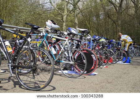 DORDRECHT, NETHERLANDS - APRIL 14 2012: Run Bike Run Bike Run duathlon event. Competition bikes stacked up in a row before the race on Saturday 14 April 2012 in Dordrecht.
