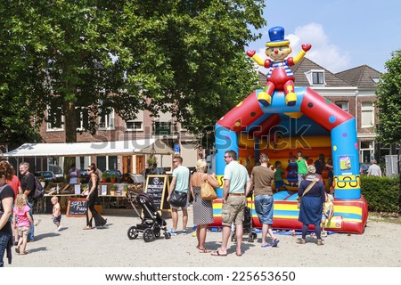 DORDRECHT, NETHERLANDS - AUGUSTUS 10, 2014: Selling coffee and tea out of a car at the summer Swan Market in Dordrecht. The lifestyle market was originally started in vacant shops in Rotterdam