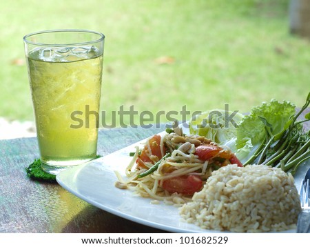 Thai Vegetarian, consists of papaya salad, Lemon grass water, Rice cooked with coconut milk.