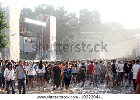 NOVI SAD, SERBIA - JULY 9: Audience infront of the Dance Arena in the morning hours at EXIT 2011 Music Festival, on July 9, 2011 in the Petrovaradin Fortress in Novi Sad.