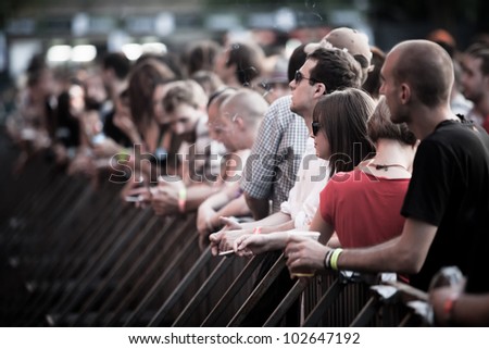 NOVI SAD, SERBIA - JULY 7: Audience infront of the Main Stage at EXIT 2011 Music Festival, during stage preparations on July 7, 2011 in the Petrovaradin Fortress in Novi Sad.