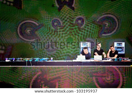NOVI SAD, SERBIA - JULY 9: Squillace, Tanzmann and Buttrich b2b perform on the Dance Arena at EXIT 2011 Music Festival, on July 9, 2011 at the Petrovaradin Fortress in Novi Sad, Serbia.