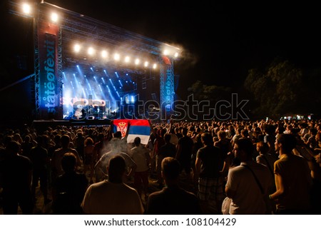 NOVI SAD, SERBIA - JULY 12: Audience in front of the Main Stage at EXIT 2012 Music Festival, during Skindred's performance on July 12, 2012 in the Petrovaradin Fortress in Novi Sad.