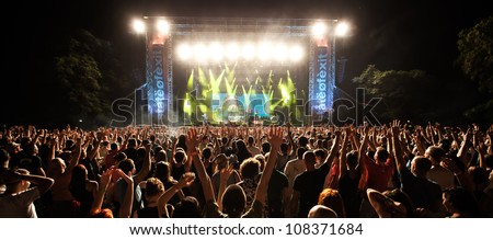 NOVI SAD, SERBIA - JULY 12: Audience in front of the Main Stage at EXIT 2012 Music Festival, during Skindred\'s performance on July 12, 2012 in the Petrovaradin Fortress in Novi Sad.