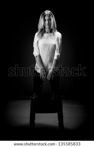 full body portrait of attractive caucasian girl with shiny blond hair