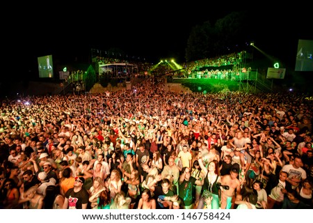 Novi Sad, Serbia - July 11: Audience In Front Of The Dance Arena At Exit 2013 Music Festival, During Fat Boy Slim\'S Performance On July 11, 2013 In The Petrovaradin Fortress In Novi Sad.