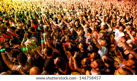 Novi Sad, Serbia - July 11: Audience In Front Of The Main Stage At Exit 2013 Music Festival, During Snoop Dogg\'S Performance On July 11, 2013 In The Petrovaradin Fortress In Novi Sad.