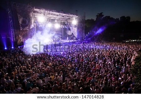 NOVI SAD, SERBIA - JULY 13: Crowd in front of the Dance Arena at EXIT 2013 Music Festival, during Steve Angelo\'s performance on July 13, 2013 in the Petrovaradin Fortress in Novi Sad.
