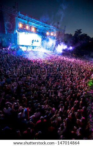 NOVI SAD, SERBIA - JULY 13: Crowd in front of the Dance Arena at EXIT 2013 Music Festival, during Steve Angelo\'s performance on July 13, 2013 in the Petrovaradin Fortress in Novi Sad.