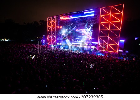 NOVI SAD, SERBIA - JULY 11: Audience infront of the Dance Arena at EXIT 2014 Music Festival, during Carl Cox\'s performance on July 11, 2014 in the Petrovaradin Fortress in Novi Sad.