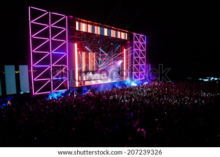 NOVI SAD, SERBIA - JULY 11: Audience infront of the Dance Arena at EXIT 2014 Music Festival, during Carl Cox\'s performance on July 11, 2014 in the Petrovaradin Fortress in Novi Sad.