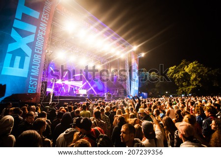NOVI SAD, SERBIA - JULY 11: Audience infront of the Main Stage at EXIT 2014 Music Festival, during Koven\'s performance on July 11, 2014 in the Petrovaradin Fortress in Novi Sad.