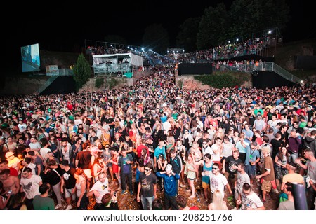 NOVI SAD, SERBIA - JULY 12: Audience infront of the Dance Arena at EXIT 2014 Music Festival, during Tiga and DJ Hell performance on July 12, 2014 in the Petrovaradin Fortress in Novi Sad.