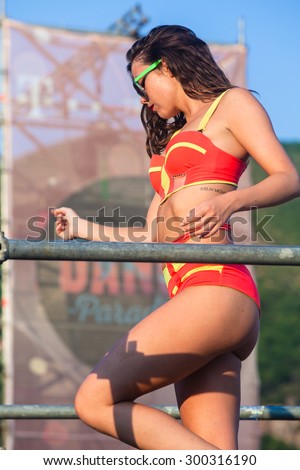 JAZ, MONTENEGRO - JULY 16 2015: Female performer dances infront of the Dance Paradise stage at SEA DANCE Music Festival - EXIT ADVENTURE, on July 16, 2015 at the Jaz beach near Budva, Montenegro.