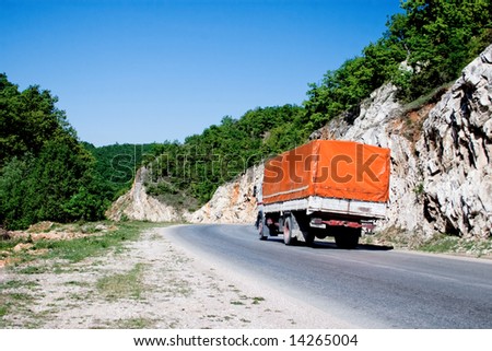 truck on a road in the mountains