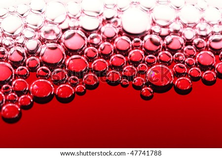 abstract red wine bubbles, close up shot