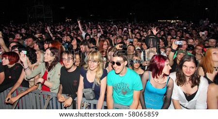 NOVI SAD, SERBIA - JULY 9: Audience infront of the Main Stage at the Best European Music Festival - EXIT 2010, on July 9, 2010 in the Petrovaradin Fortress in Novi Sad.