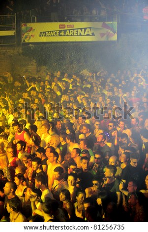 NOVI SAD, SERBIA - JULY 8: Audience infront of the Dance Arena at EXIT 2011 Music Festival, during UNDERWORLD\'s porformance on July 8, 2011 in the Petrovaradin Fortress in Novi Sad.