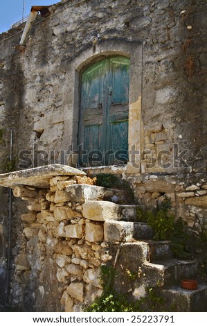 Old fashioned door in traditional cretan village
