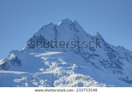 Peak of Mt. Tantalus at the southern end of the Coastal Mountains of British Columbia, Canada against blue sky