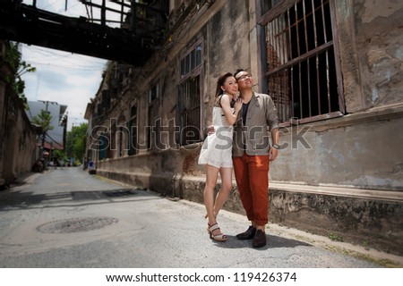 Retro couple at old background