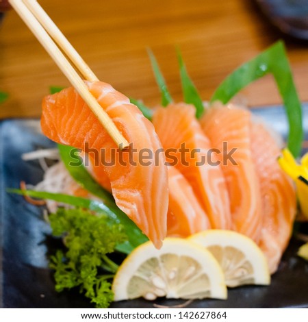 Sashimi with chop sticks