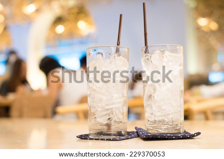 glass of water on table in cafe