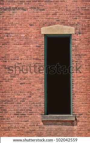 Brick Wall with Tall Dark Window for your copy, clipping path