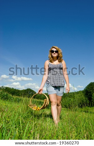 Girl Enjoying Relaxing Walk in Field