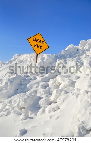 Dead End Sign in Snow Pile