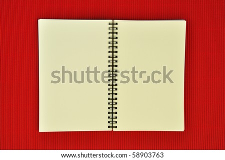 Recycle notebook on red background