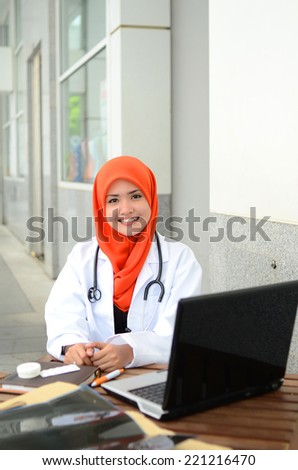 Confident Muslim medical student pose at hospital