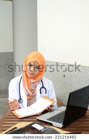 Confident Muslim medical student pose at hospital