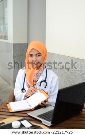 Confident Muslim medical student study at hospital