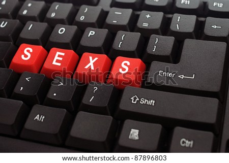 stock photo sexs red button word on black keyboard