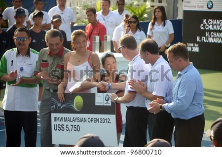 KUALA LUMPUR - MARCH 4:Hao-Ching Chan and Rika Fujiwara won Runners-up in the BMW Malaysian Open 2012 doubles final match in Kuala Lumpur, Malaysia on March 4, 2012. They win a prize of US$ 5,570.