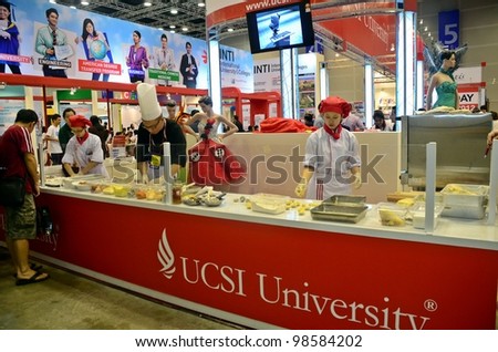 KUALA LUMPUR, MALAYSIA - MARCH 17: University of USCI promote the exhibition during the Falcon Education Fair 2012 at Kuala Lumpur Convention Centre (KLCC) March 17, 2010 in Kuala Lumpur.