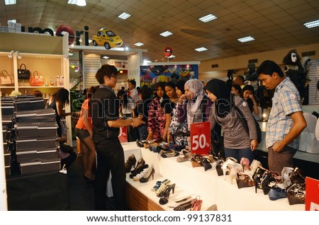 KUALA LUMPUR, MALAYSIA - MARCH 30: Malaysia International Shoe Festival 2012 attracted local and international visitor to Putra World Trade Centre March 30, 2010 in Kuala Lumpur Malaysia.