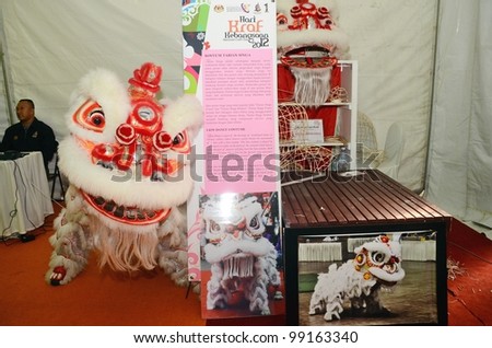 KUALA LUMPUR, MALAYSIA - MARCH 30: Lion dance equipment and accessories on display during National Craft Day 2012 at the Kuala Lumpur Craft Complex on March 30, 2012 in Kuala Lumpur, Malaysia