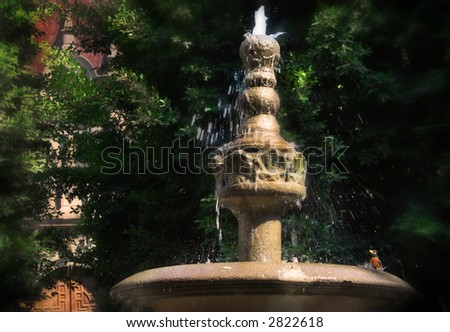 colonial style fountain with bird
