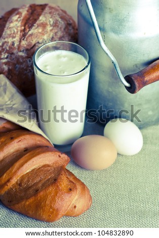 Close up of healthy  products includes milk, eggs and bakery