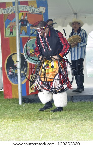 WINNIPEG, MB - JUNE 20:First Nations hoop dancer plays for the Kids Fest 2012 at the Forks. June 20, 2012 in Winnipeg, Manitoba