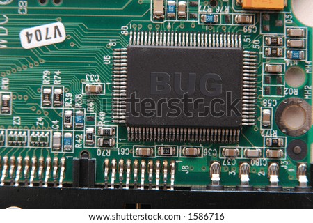 computer chip with bug written on the main chip.