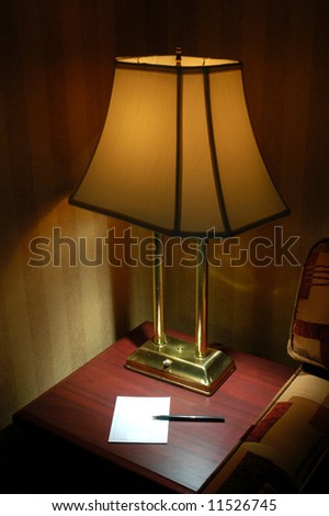 memo pad by the lamp stand
