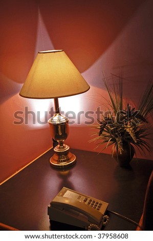 desk lamp and telephone