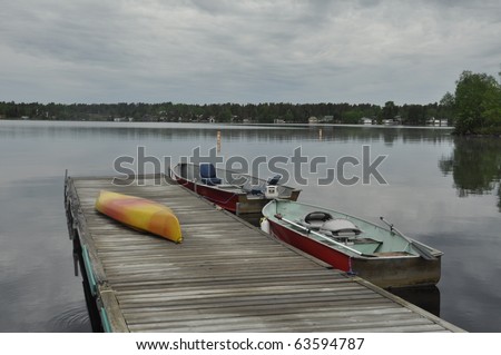 boat launch area with boat and kayak on display